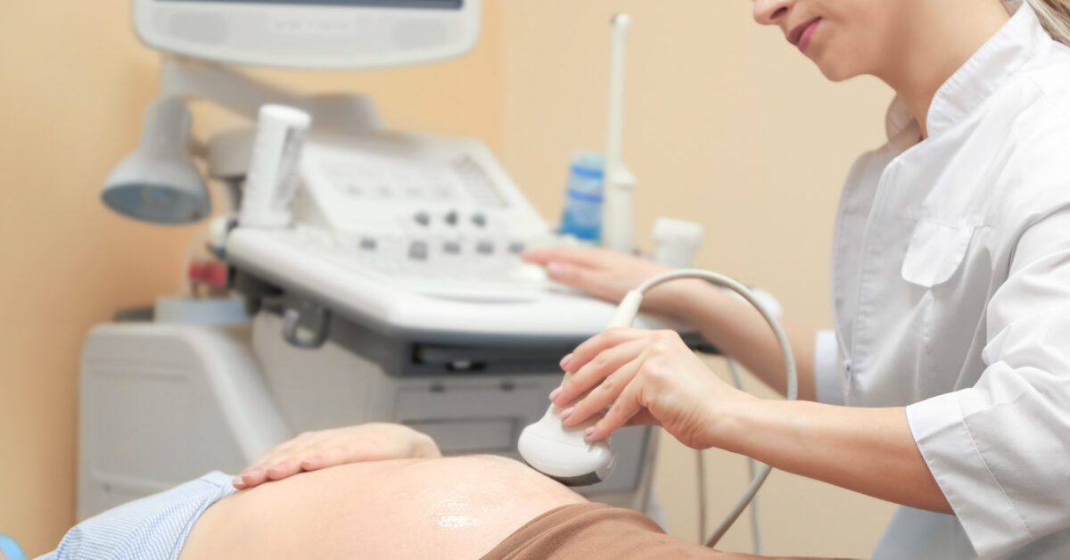 Pregnant woman undergoing Ultrasound.